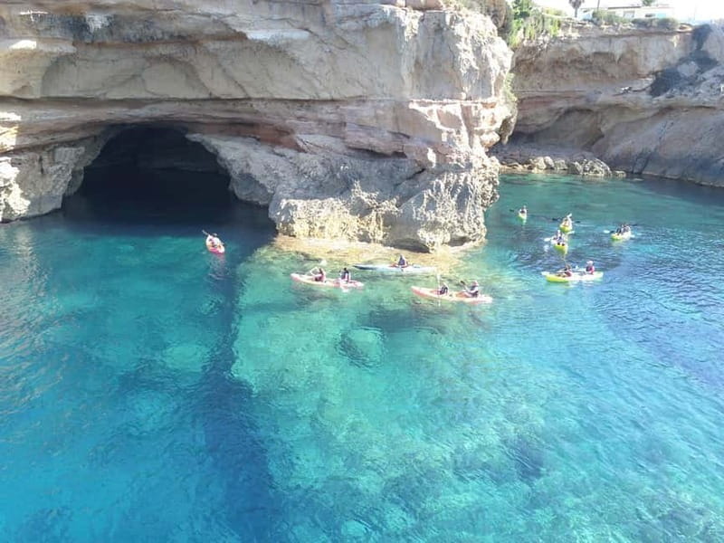 Cala Codolar: Guided Sea Kayaking and Snorkeling Tour - Getting there the day of: meeting point, timing, and weather changes