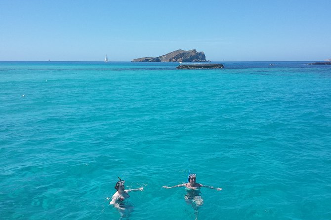 Cala Comte Private Catamaran Tour - Onboard Comfort: Speakers, WiFi, Soft Drinks, and Real Deck Time