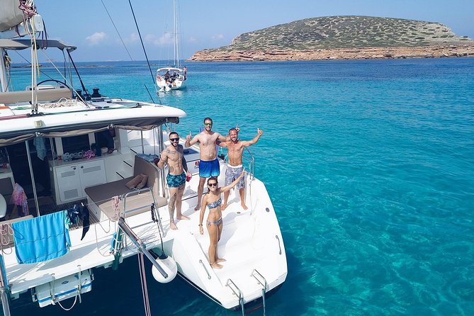 Discover Cala Bassa and Cala Comte on board a catamaran - Cala Comte: The Blue-Water Stop You’ll Be Waiting For