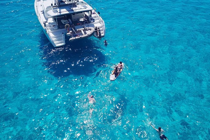 Discover Cala Bassa and Cala Comte on board a catamaran - Private Catamaran Time: Group Size, Duration, and the Flow of the Day