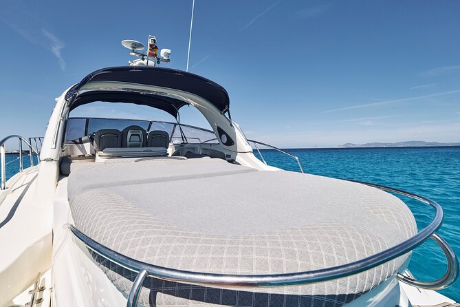 Enjoy an unforgettable experience with the Elegant CRANCHI 47 - Stop 3: Cala Saona for snorkeling, paddle time, and a sunset return