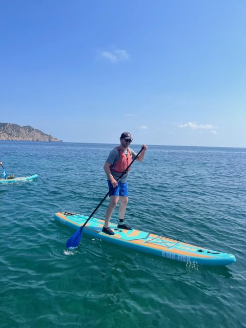 Es Figueral: Standup Paddleboarding Adventure - Return to Es Figueral and Beach Stretches to Finish Smooth