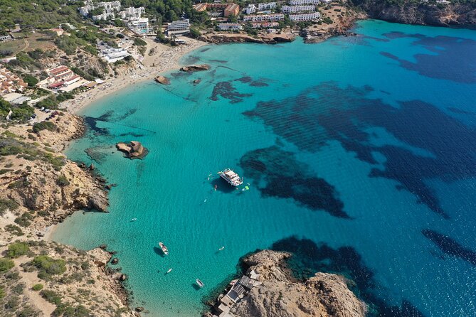 Ibiza Beach Hopping Cruise with Paddleboards, Drinks and Food 6h - Music and the vibe: family-friendly, not stiff