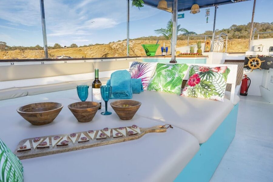 Ibiza by Sea: Coves, Caves, Water Sports & Open Bar - Stop-by-Stop: What You’ll Do and Why It Works