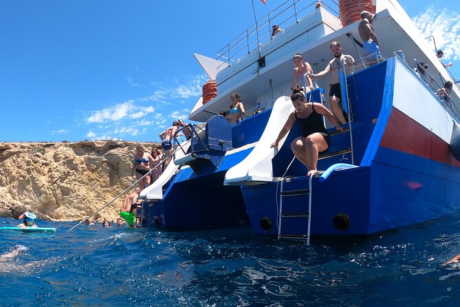 Ibiza: Es Vedrà Catamaran Cruise – Morning or Sunset - Onboard vibe: stability, a free bar, and that slide moment