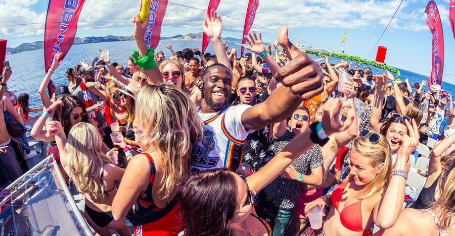 Ibiza: Ocean Club Boat Party with Premium Drinks, Food, & DJ - Swim Stop in the Mediterranean: SPF 60, Flips, and Chill Time
