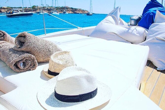 Ibiza: Private Sailboat with Tapas, Open Bar & Music - Cruising Sant Antoni Bay and seeing Port des Torrent from the water