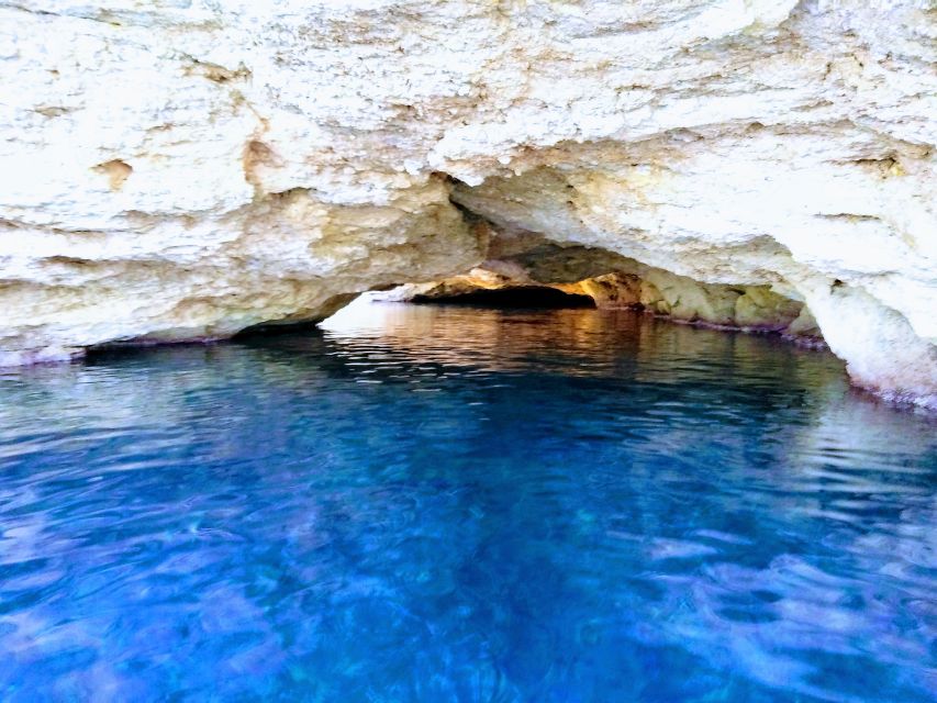 Ibiza: Sea Caves & Coves Snorkeling Paddle Boarding Tour - Drinks, fruit, and the onboard vibe that keeps the energy up