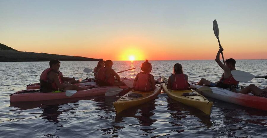 Ibiza: Sea Kayaking at Sunset and Sea Caves Tour - Sea Caves and Golden Hour Around Portinatx