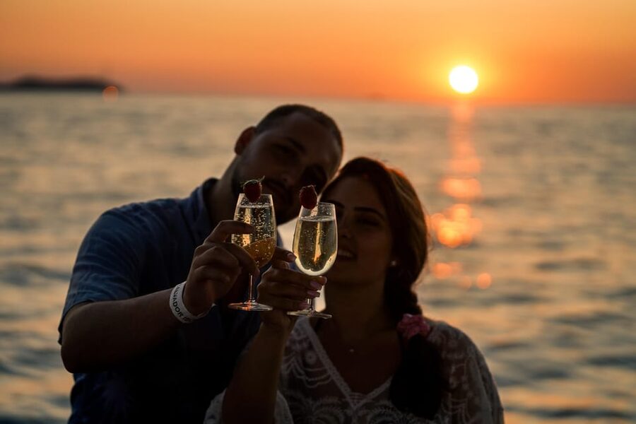 Ibiza: Secret Coves Guided Boat Tour with Open Bar and Tapas - Setting sail from San Antonio port on Salvador Ibiza