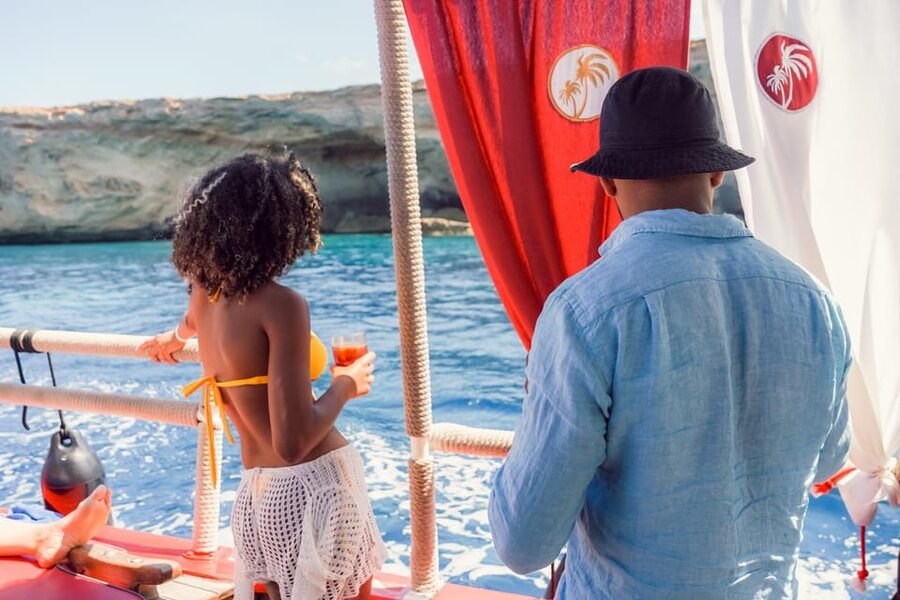 Ibiza: Secret Coves Guided Boat Tour with Open Bar and Tapas - Onboard comfort: deck time, restrooms, and how the boat is set up