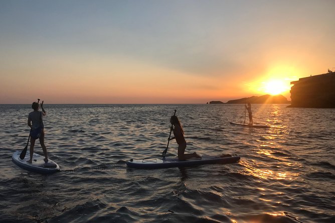 Ibiza Stand Up Paddle Surf Sunset Tour - Water conditions and rock jumps: the fun part with a reality check