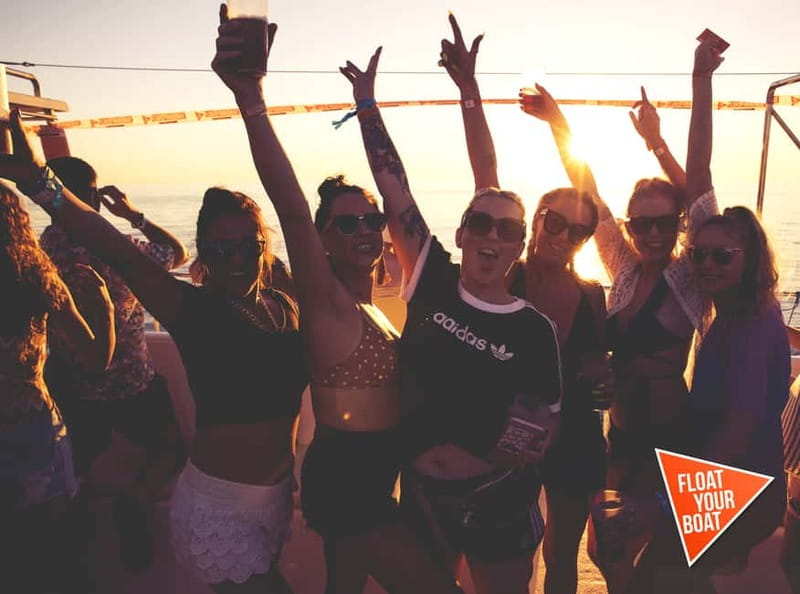 Ibiza: Sunset Boat Party Cruise with DJs with 2 Clubs - The coastline, the deck, and motion: making the most of sunset on water