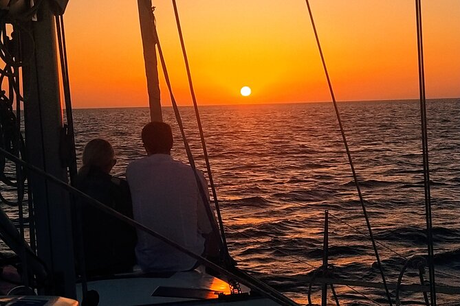 Ibiza sunset boat trip with appetizers and champagne, 6 guests - The route feel: cruising past cliffs, coves, and that slow golden-hour shift