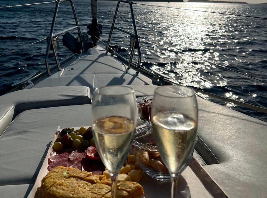 Ibiza: Sunset boat trip with appetizers, only up to 6 guests - What you’ll see: cliffs, coves, and the Ibiza shoreline from sea level
