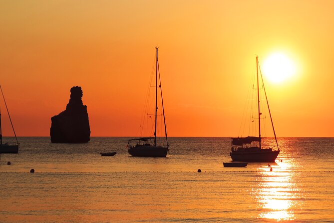 Ibiza Sunset or Afternoon Cruise - Cala Comte: Clear Water and That Cliff Backdrop Moment