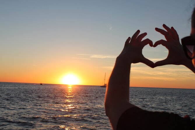 Ibiza Sunset Snorkeling Beach and Cave Tour - San Antonio Bay sea cave: the first splash and the real reason this tour feels different