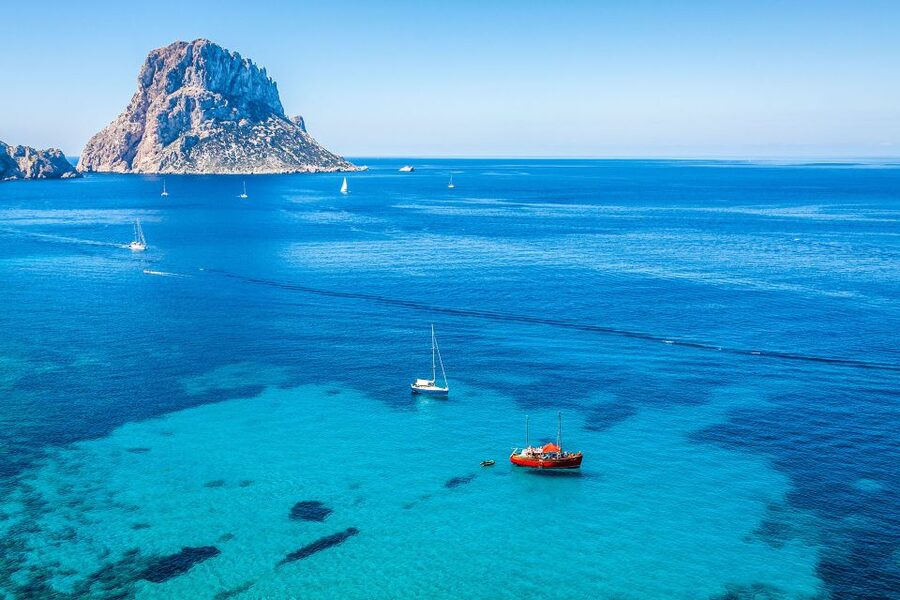 Jet Ski Tour to Es Vedra from San Antonio No license needed - Es Vedrà break time: swim, snorkel-style exploring, and photo moments