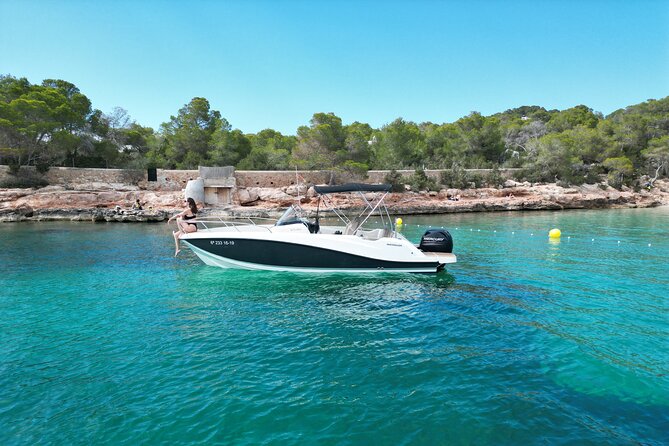 Private Boat Tour of San Antonio with Paddel surfing and Snorkeling - The vibe on board with Mario: relaxed pacing beats hurried sights