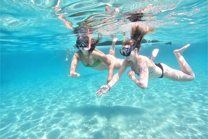 Private Hydro-Jet Snorkeling Beach and Cave Cruise Tour - From Palapa Ibiza to the first cala: San Antonio Bay timing that actually works