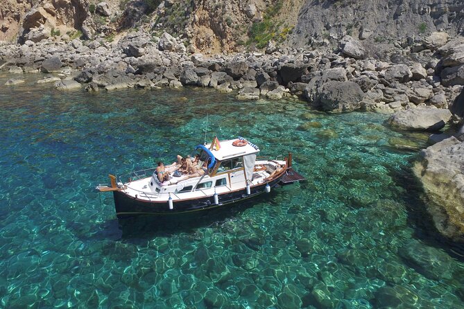 Private Mediterranean classic boat with Paddle boards+Snorkelling - Sunset cruises and music: how the vibe usually works