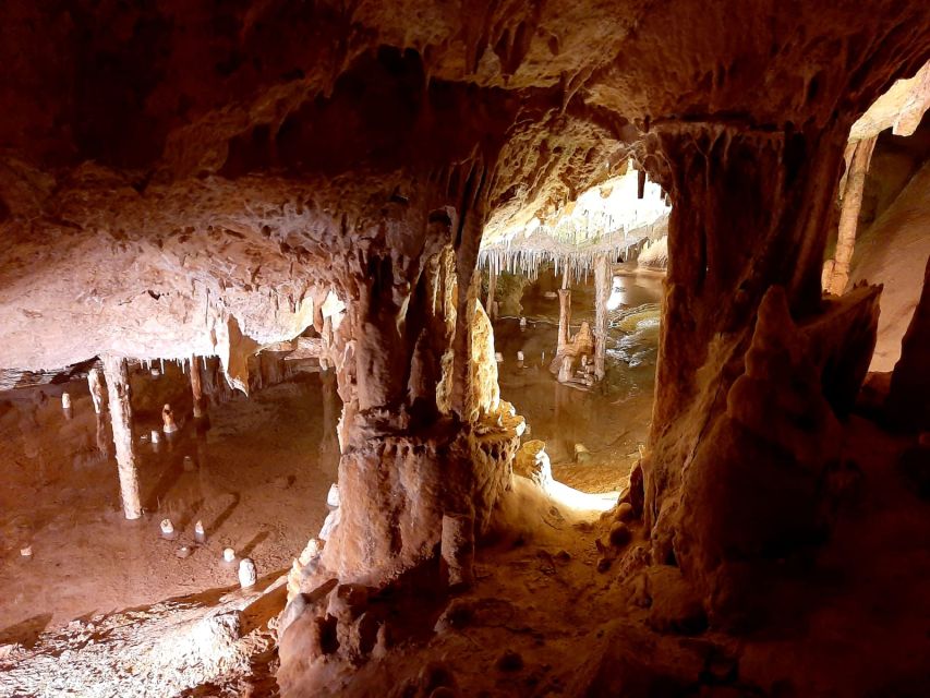 Puerto de San Miguel: Can Marçá Cave Guided Tour with Entry - Inside the cave: formations, dry channels, and the showy-but-useful effects