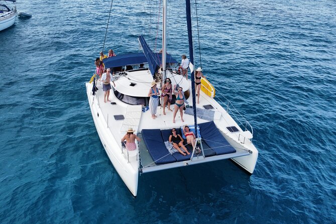 Unforgettable experience in Catamaran Ibiza and Formentera! - Stop 4: Platja de Cala d’Hort (Snorkel, SUP, and Lunch Choice)